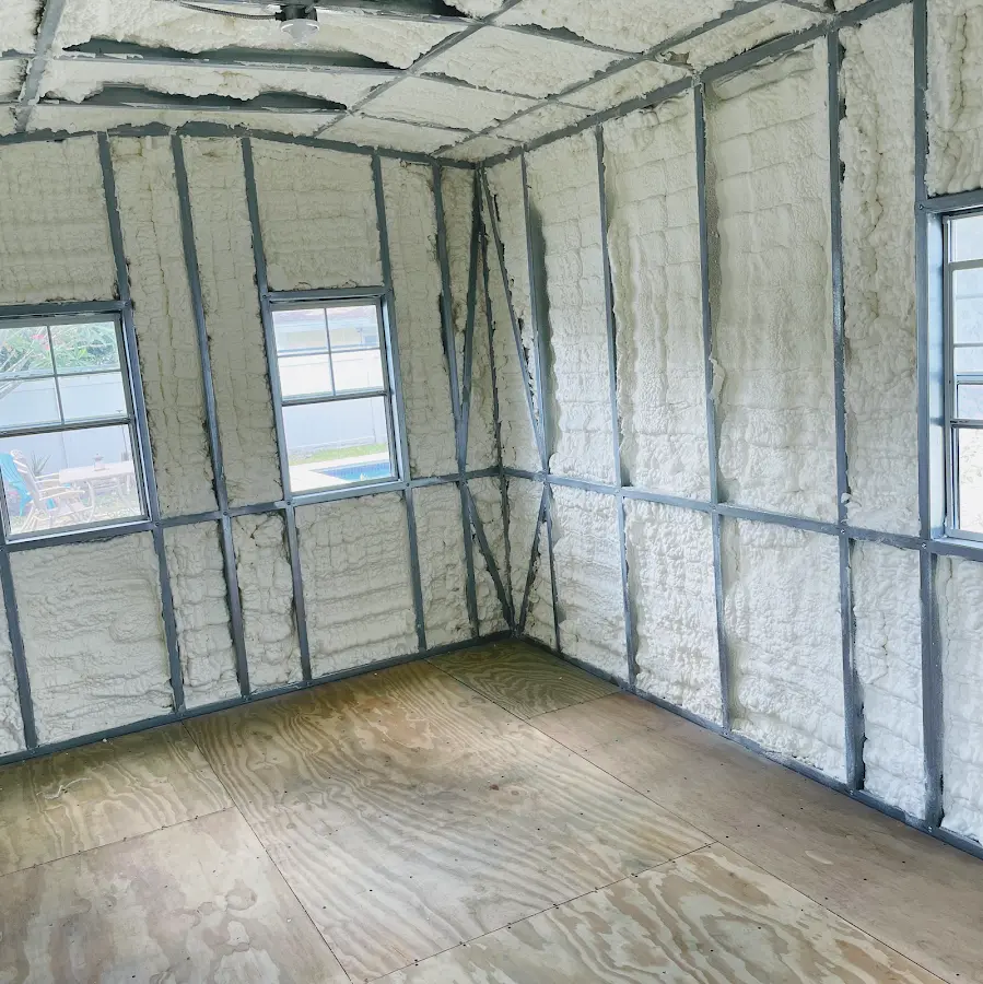 Closed-cell spray foam insulation applied to wall cavities in a residential project in El Centro